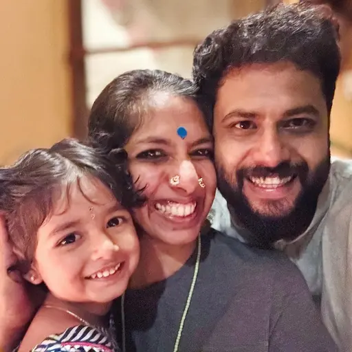 Devi, Priya and Aseem, cheek to cheek